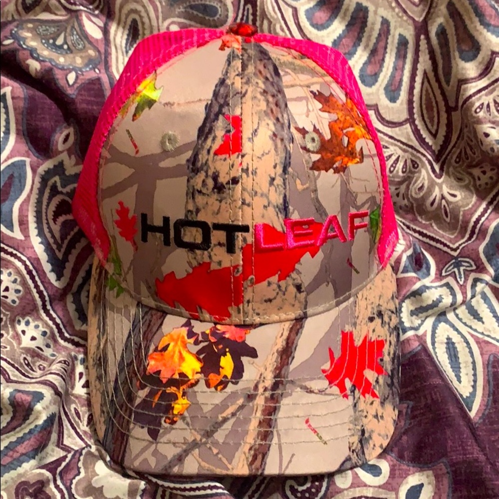A hot leaf brand snap back hat.